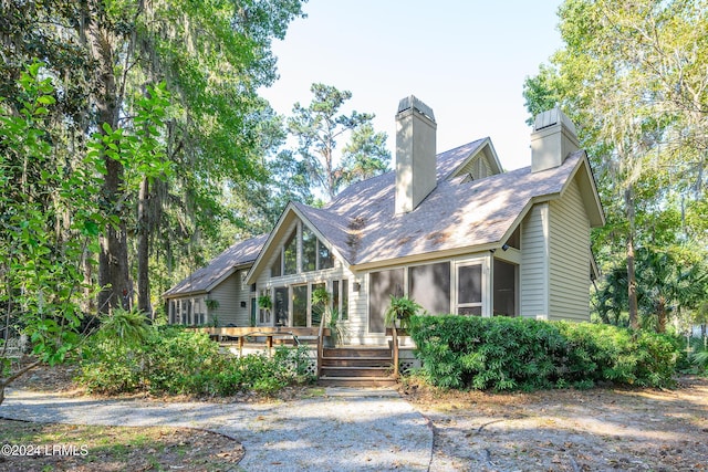 view of front of house with a wooden deck