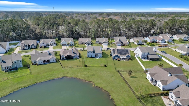 aerial view featuring a residential view and a water view