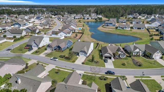 birds eye view of property featuring a residential view and a water view