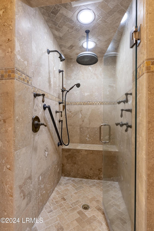 full bathroom featuring a shower stall