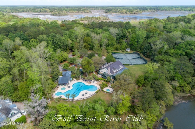 aerial view featuring a water view and a view of trees