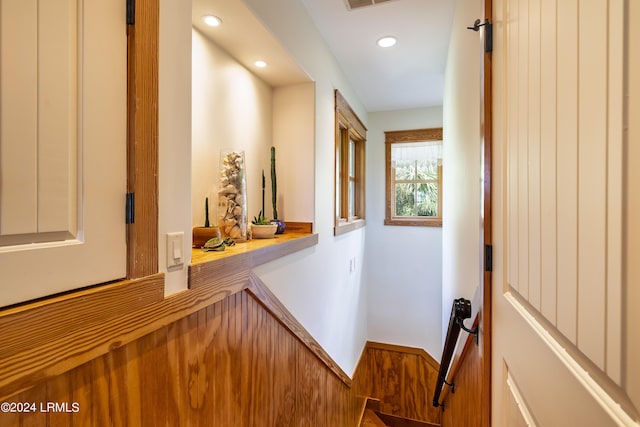 hallway featuring visible vents and recessed lighting