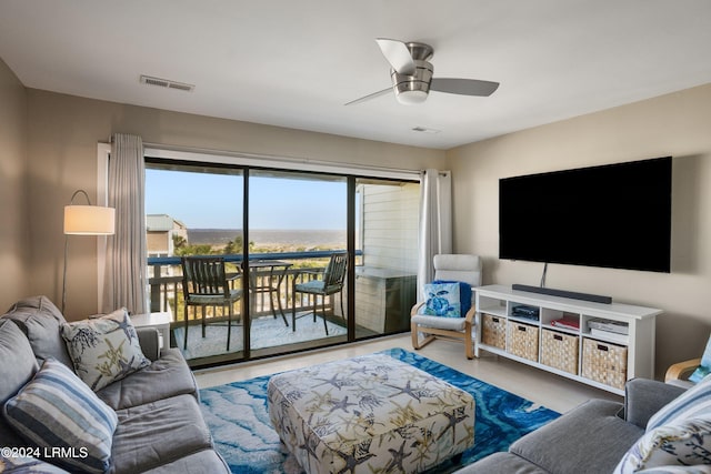 living room with ceiling fan