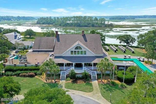 drone / aerial view featuring a water view