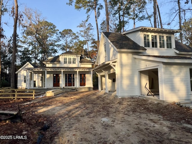 exterior space with a garage and a porch