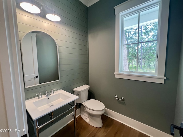 14 Heron Pt, Okatie, SC 29909 - bathroom featuring wood walls, wood finished floors, and vanity