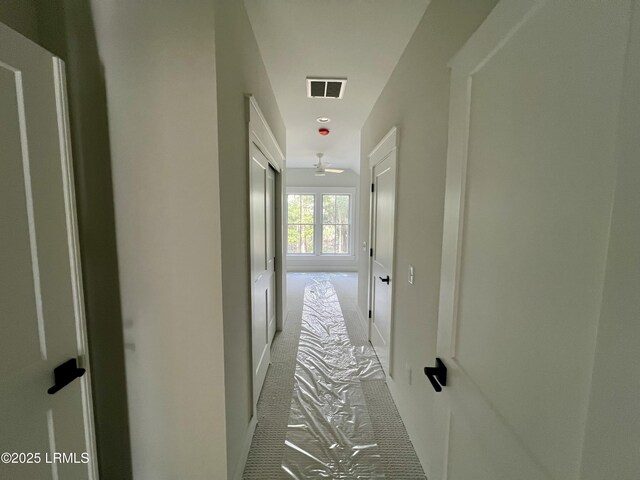 14 Heron Pt, Okatie, SC 29909 - corridor with light carpet and baseboards