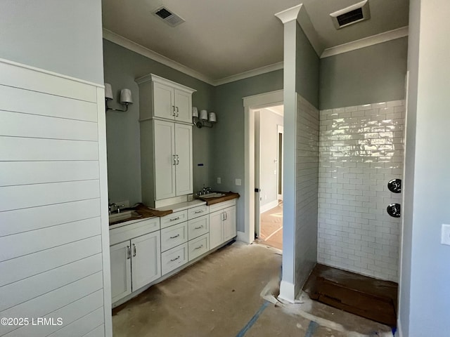 14 Heron Pt, Okatie, SC 29909 - full bathroom with double vanity, a tile shower, and ornamental molding