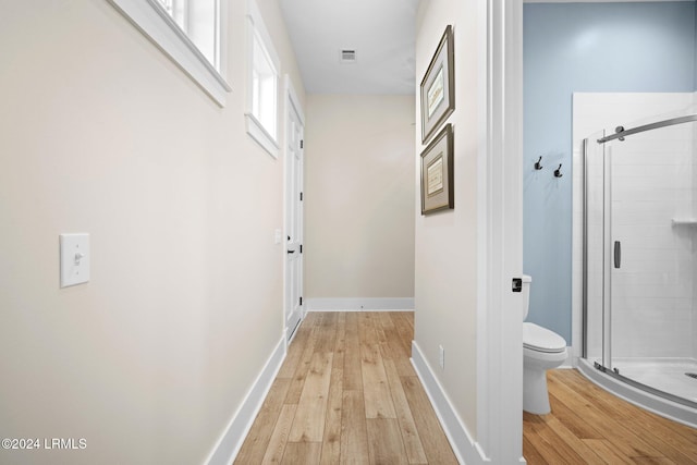 corridor featuring light wood-type flooring