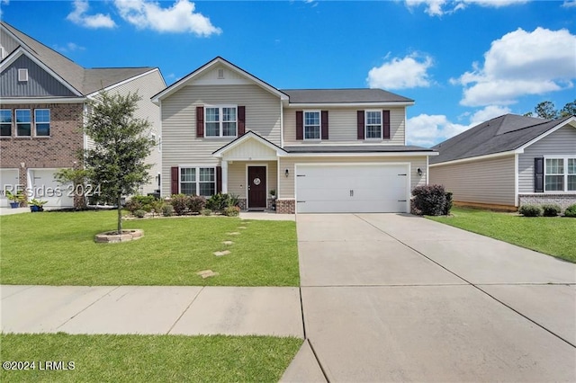 view of front of home featuring a garage and a front yard