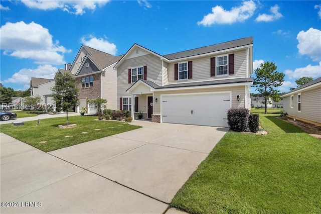 view of front of home featuring a garage and a front yard