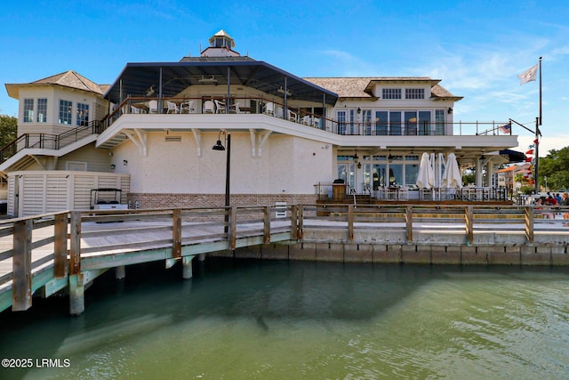19 Stoney Creek Rd Unit 296, Hilton Head Island, SC 29928 - rear view of house with a water view and stucco siding