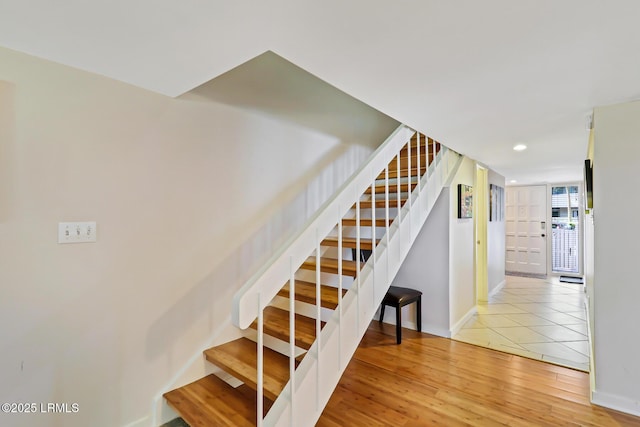 19 Stoney Creek Rd Unit 296, Hilton Head Island, SC 29928 - stairway featuring recessed lighting and wood finished floors