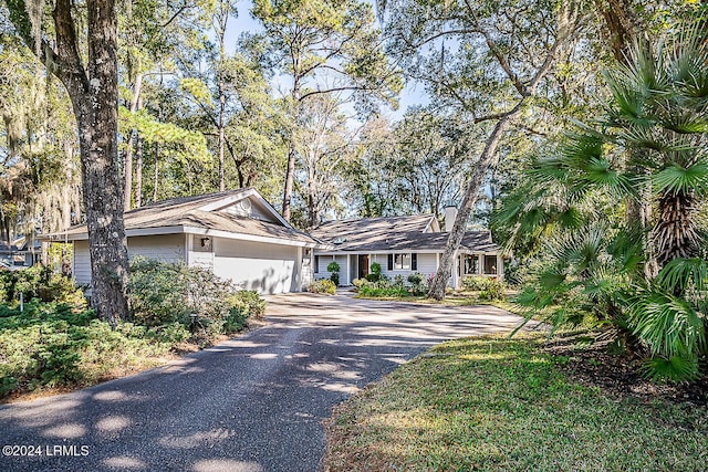 ranch-style home with a garage