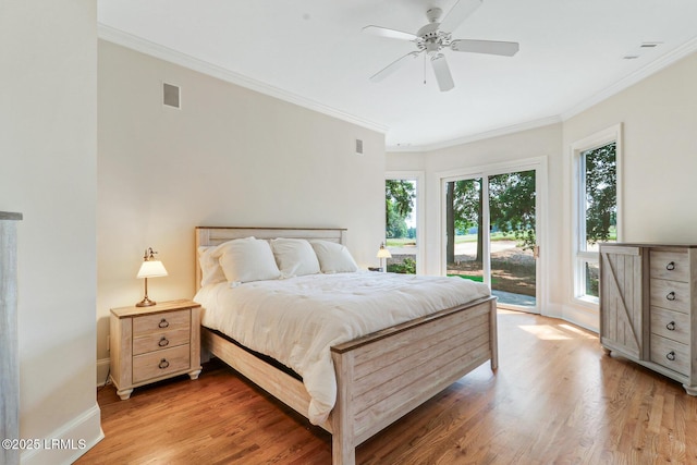 45 Manchester Ct, Bluffton, SC 29910 - bedroom with access to exterior, light wood-style flooring, ornamental molding, baseboards, and a ceiling fan