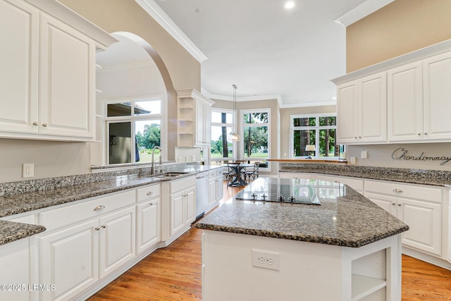 45 Manchester Ct, Bluffton, SC 29910 - kitchen with open shelves, ornamental molding, a sink, black electric cooktop, and white cabinetry