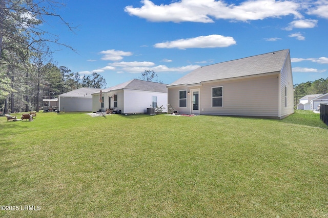580 Rudy Dr, Hardeeville, SC 29927 - rear view of property featuring a lawn