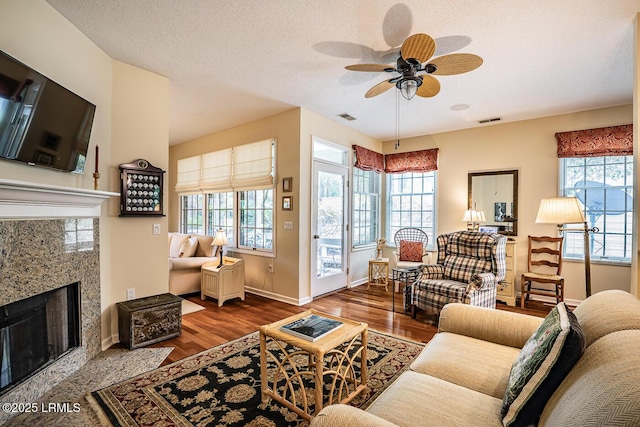 459 Bb Sams Dr, Saint Helena Island, SC 29920 - living area with visible vents, ceiling fan, plenty of natural light, and a high end fireplace