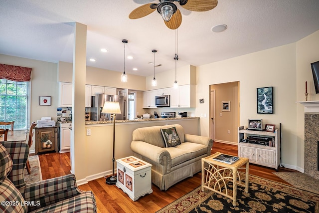 459 Bb Sams Dr, Saint Helena Island, SC 29920 - living area featuring dark wood-type flooring, a ceiling fan, and recessed lighting