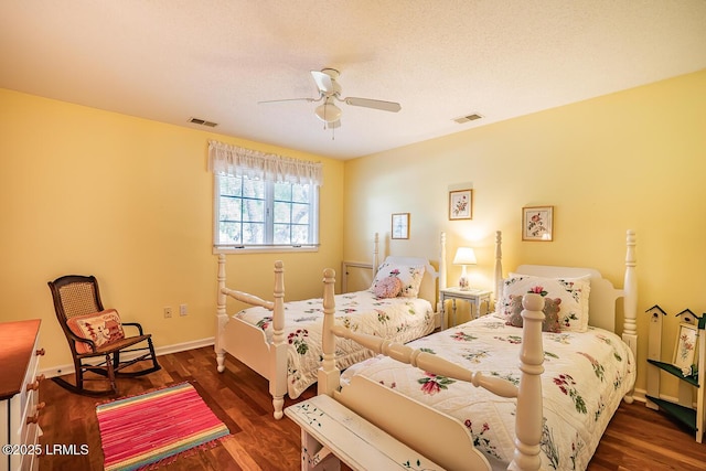 459 Bb Sams Dr, Saint Helena Island, SC 29920 - bedroom with baseboards, visible vents, wood finished floors, and ceiling fan
