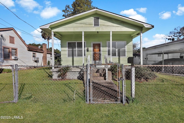 view of front of house with a porch and a front lawn