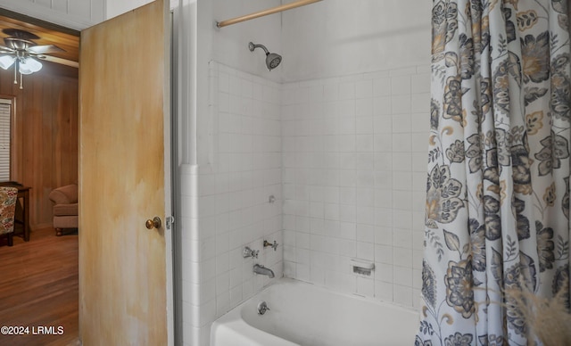 bathroom featuring ceiling fan, shower / tub combo, and hardwood / wood-style floors