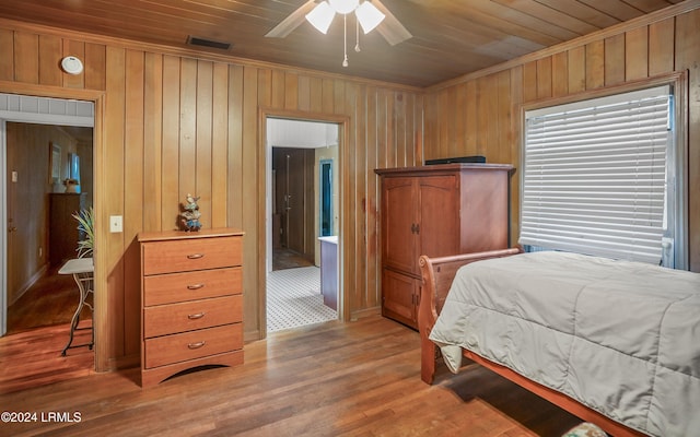 bedroom featuring wooden ceiling, light hardwood / wood-style floors, and ceiling fan