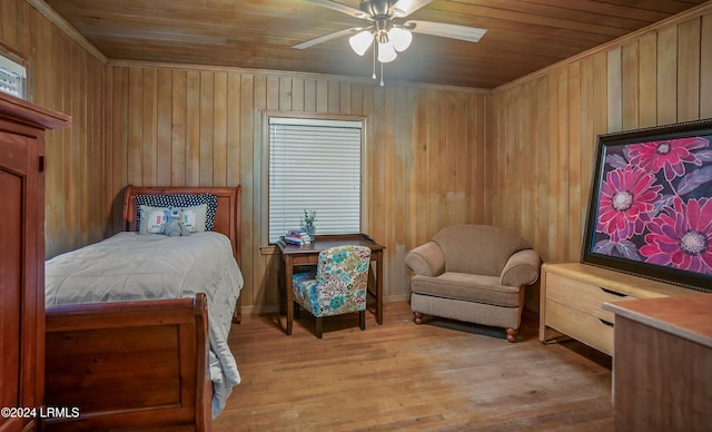 bedroom featuring light wood-type flooring, wood ceiling, and ceiling fan