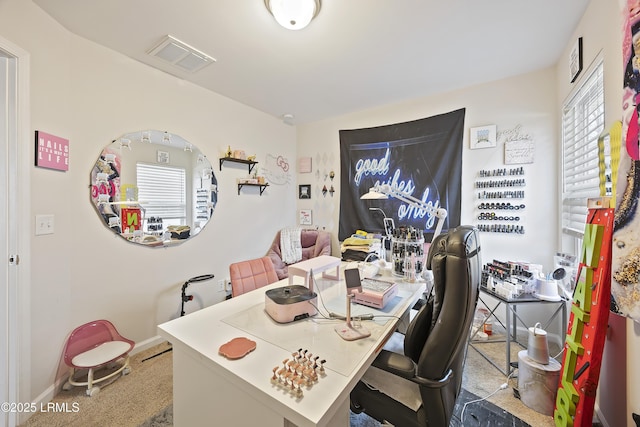 home office featuring visible vents and baseboards