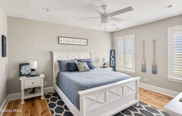 18 Sand Dollar Ct, Harbor Island, SC 29920 - bedroom featuring hardwood / wood-style flooring and ceiling fan