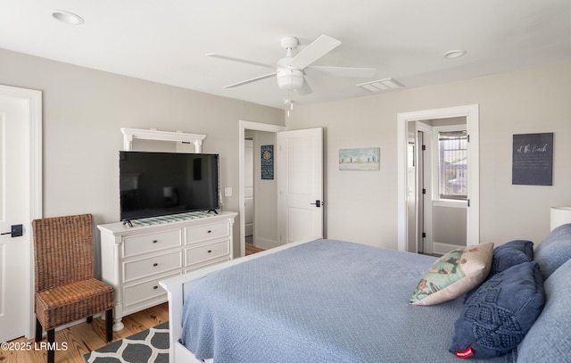18 Sand Dollar Ct, Harbor Island, SC 29920 - bedroom with ceiling fan and light wood-type flooring