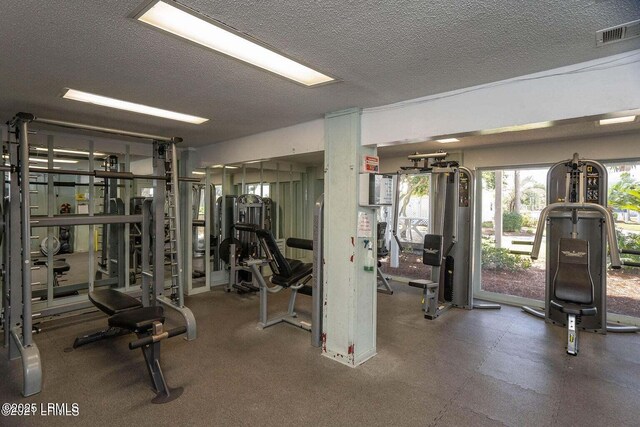 18 Sand Dollar Ct, Harbor Island, SC 29920 - workout area with a textured ceiling