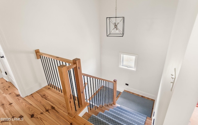 18 Sand Dollar Ct, Harbor Island, SC 29920 - stairs featuring hardwood / wood-style floors