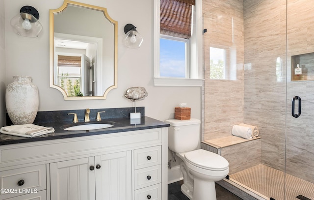 18 Sand Dollar Ct, Harbor Island, SC 29920 - bathroom with vanity, toilet, and a shower with door