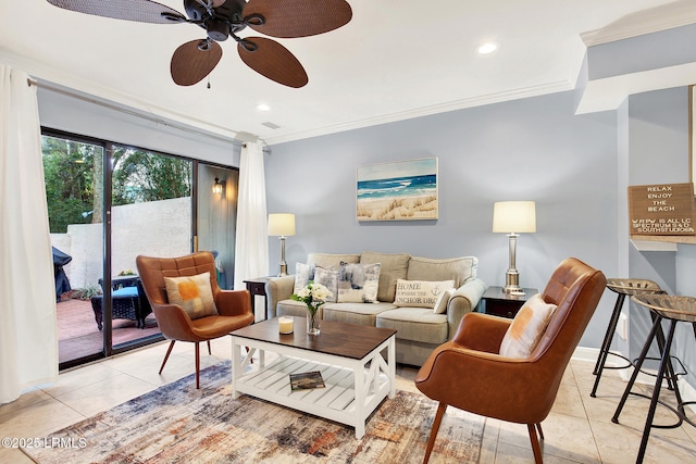 living room with ceiling fan, ornamental molding, and light tile patterned floors