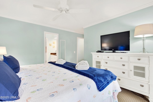 bedroom featuring ornamental molding, ceiling fan, and ensuite bathroom