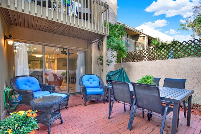 view of patio / terrace with a balcony