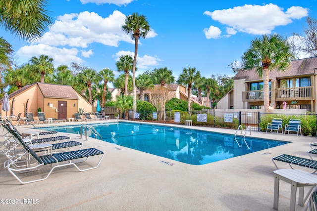 view of swimming pool with a patio