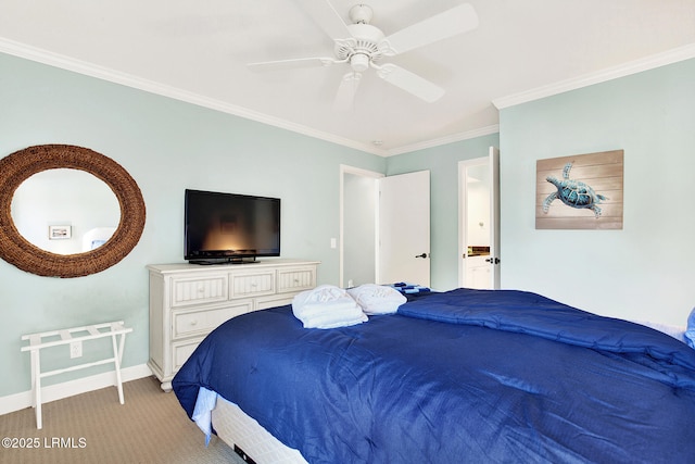 bedroom featuring ornamental molding, light colored carpet, ceiling fan, and ensuite bath