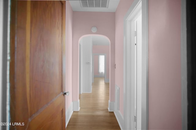 hallway featuring light hardwood / wood-style flooring