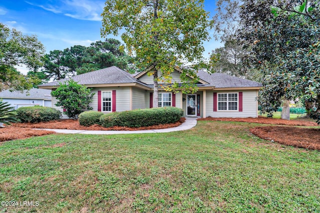 view of front of house with a front lawn