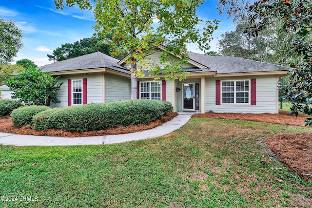 view of front of home with a front yard