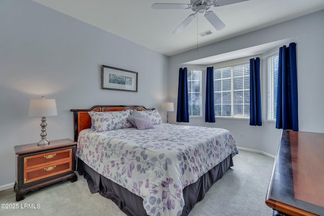 bedroom with light carpet and ceiling fan