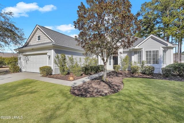 view of front of home with a garage and a front yard