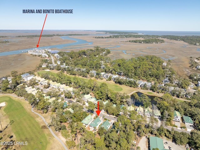 bird's eye view with golf course view and a water view