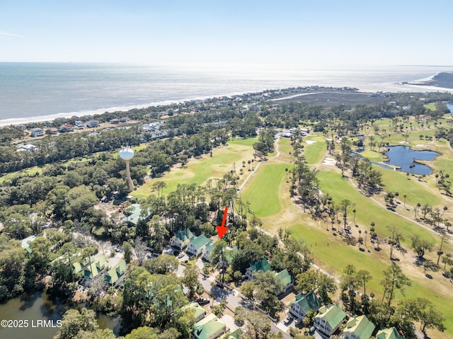 aerial view featuring view of golf course and a water view