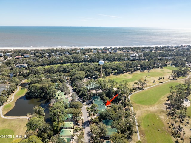 bird's eye view with a water view and view of golf course