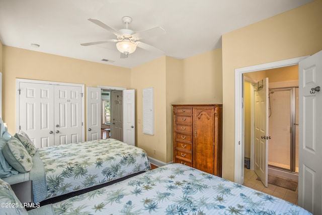 bedroom with tile patterned floors, visible vents, a closet, and ceiling fan