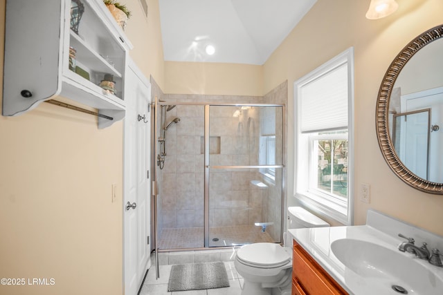 full bath featuring toilet, a stall shower, tile patterned floors, and vanity