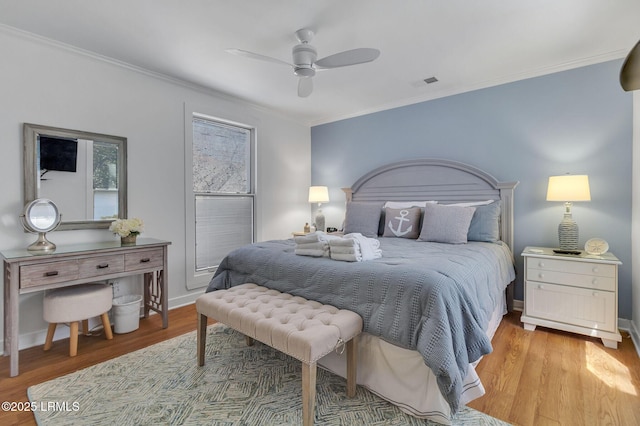 6 Lighthouse Ln Unit 963, Hilton Head Island, SC 29928 - bedroom featuring ornamental molding, wood finished floors, and ceiling fan